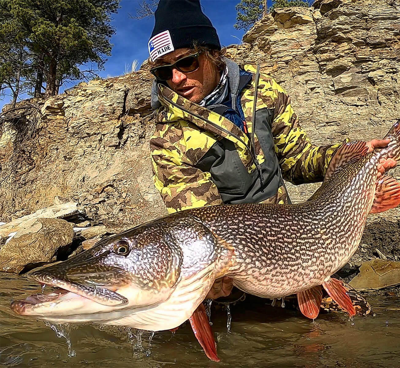 Eric Ratliff is holding onto a large fish