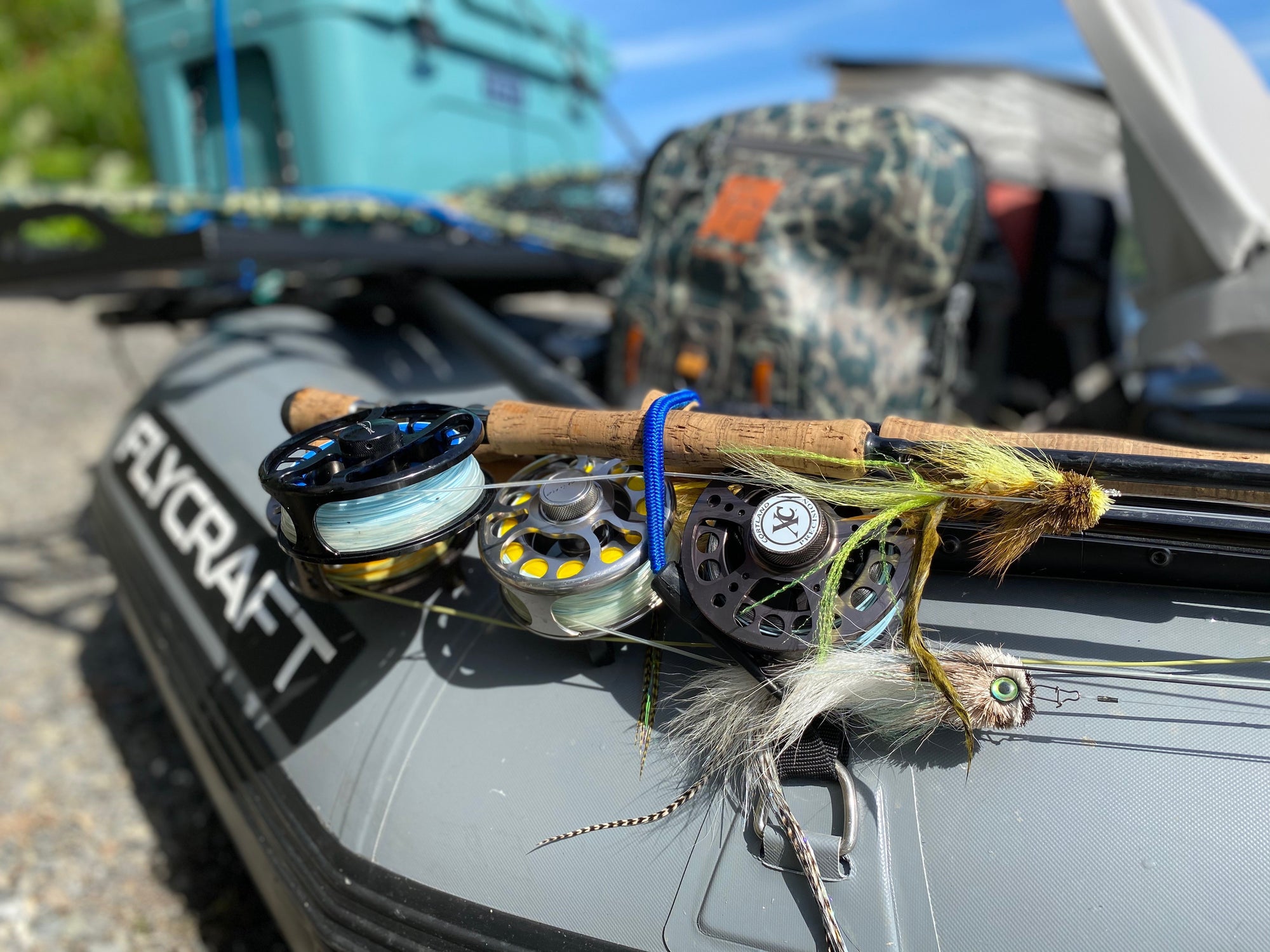 Three fly reels lined with Compact Intermediate
