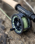 Cortland Ultralight II on a fishing reel on a wooden surface