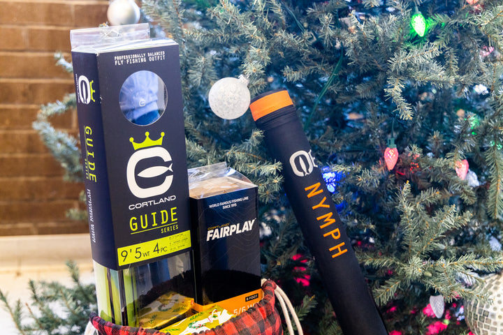 Guide Series, Fairplay, and Nymph Series Rod next to a Christmas Tree