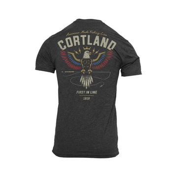 Soaring Eagle T-Shirt. The logo has Cortland at the top with an eagle holding onto a fly rod in its talons. The eagle's wings are yellow, blue, and red. 