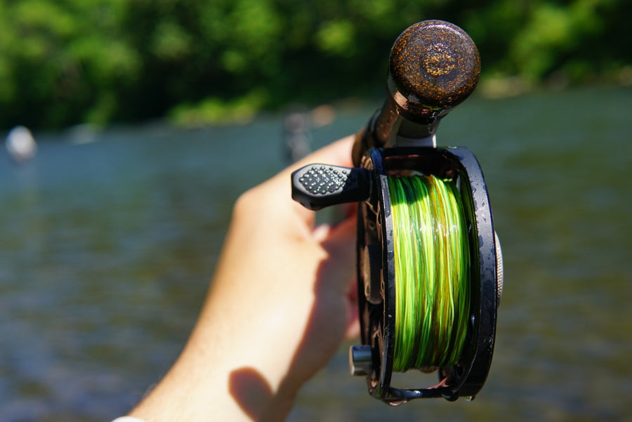 Closeup shot of a fly reel that is lined with the Hi-Vis Euro Nymph Braid Core. 